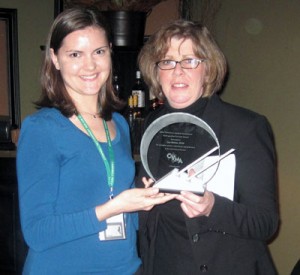 Dr. Lisa Shriver (left) was given the OVMA Distinguished Service Award by outgoing President Dr. Linda Lord (right).